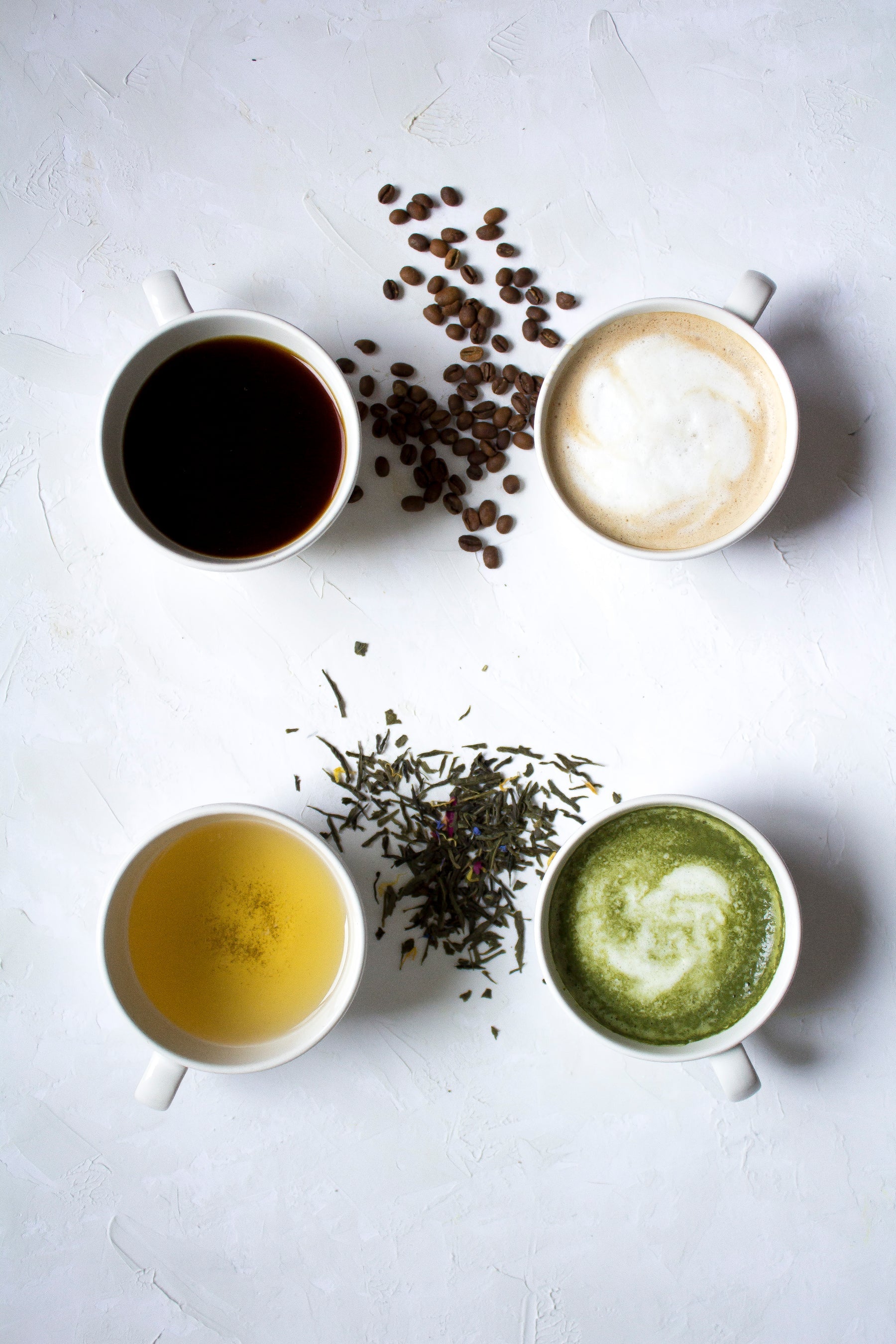 Assorted hot beverages tea matcha coffee